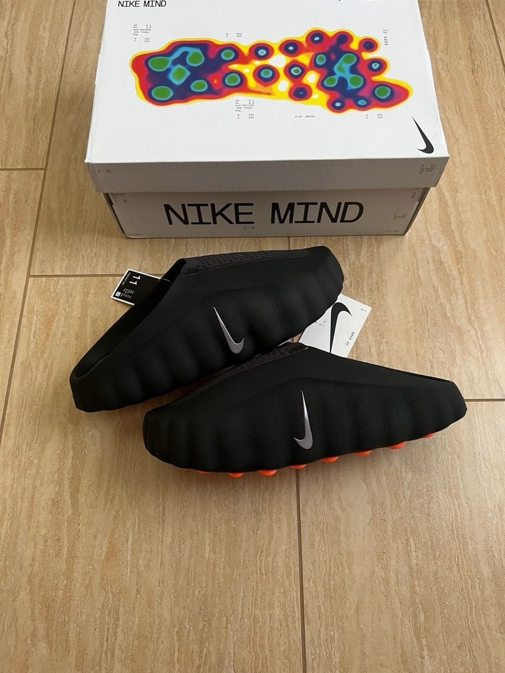Nike Black Slip-On Mind Trainers with Orange Studs